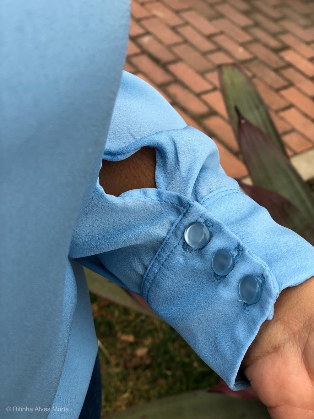 Blusa de decote redondo e manga comprida 