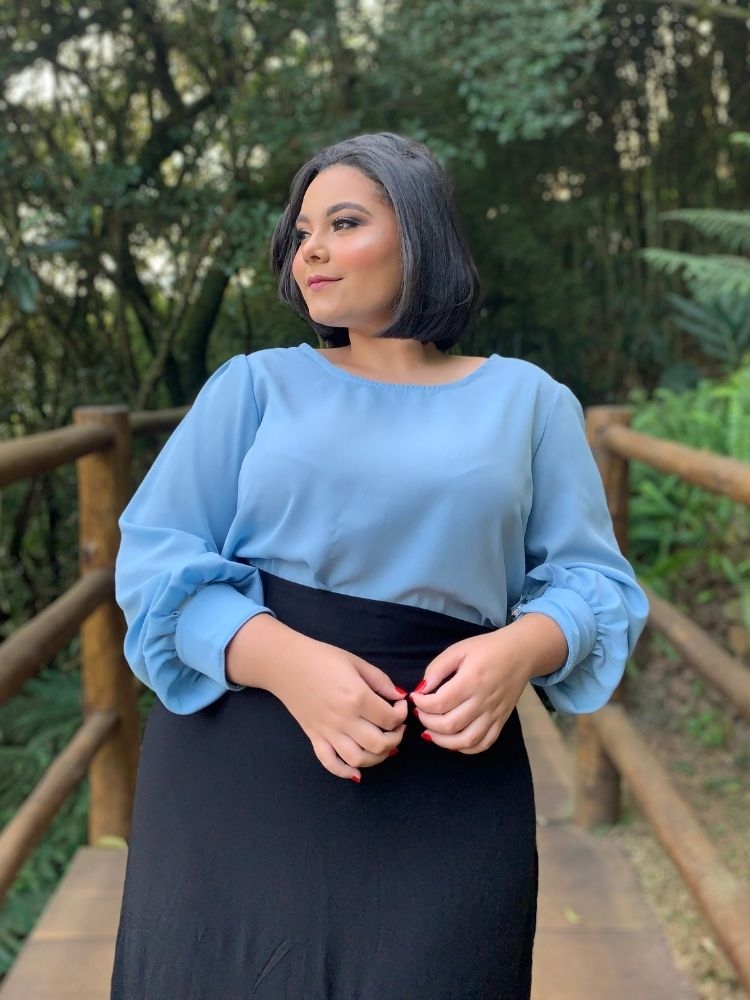 Blusa de decote redondo e manga comprida 